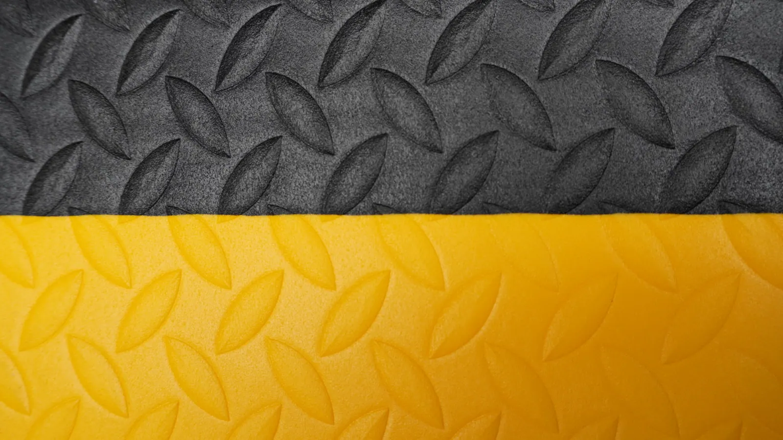 M2 diamond plate top surface close-up in black and yellow