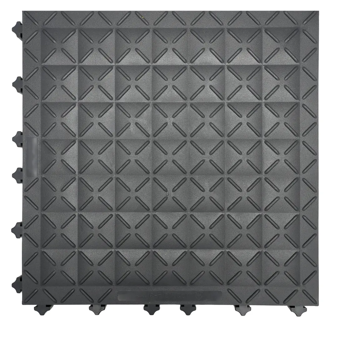 M5 anti-fatigue workstation tiles with yellow edges installed around heavy machinery.